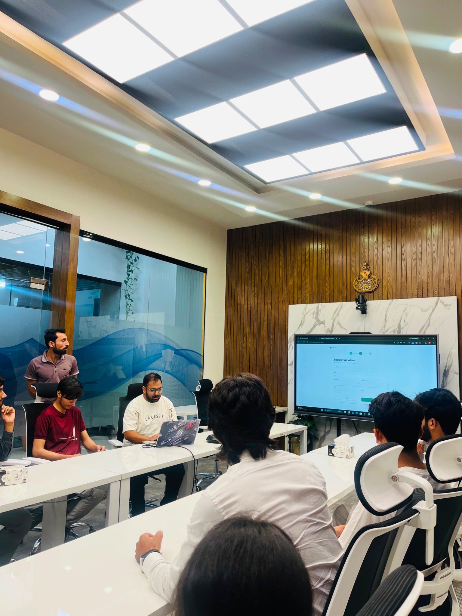 Participants watching a presentation during the SM Intern Connect gathering