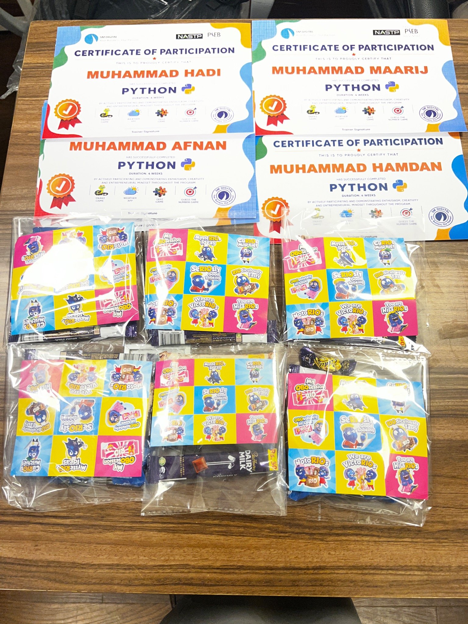 Python participation certificates and gift packs prepared for the children