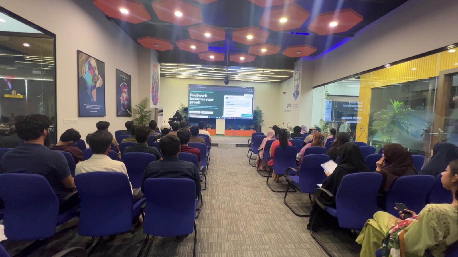 A view from the back of the room during the SM Intern Connect presentation